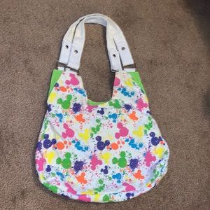 Disney purse, green interior, paint splatter Mickey Mouse exterior, no stains